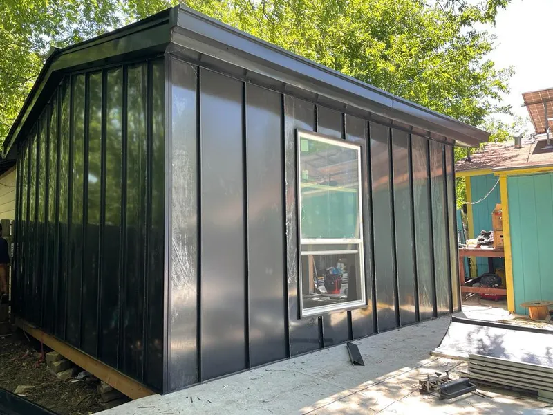 Black standing seam metal wall panels for Roof Inspection in Bee Ridge